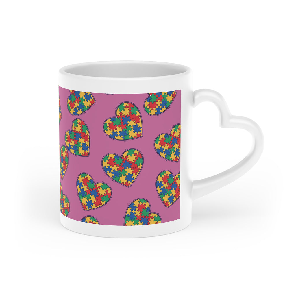 Autism Puzzle Heart Mug — Colorful Love Coffee Cup (Pink Background)
