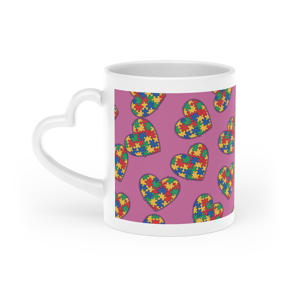 Autism Puzzle Heart Mug — Colorful Love Coffee Cup (Pink Background)