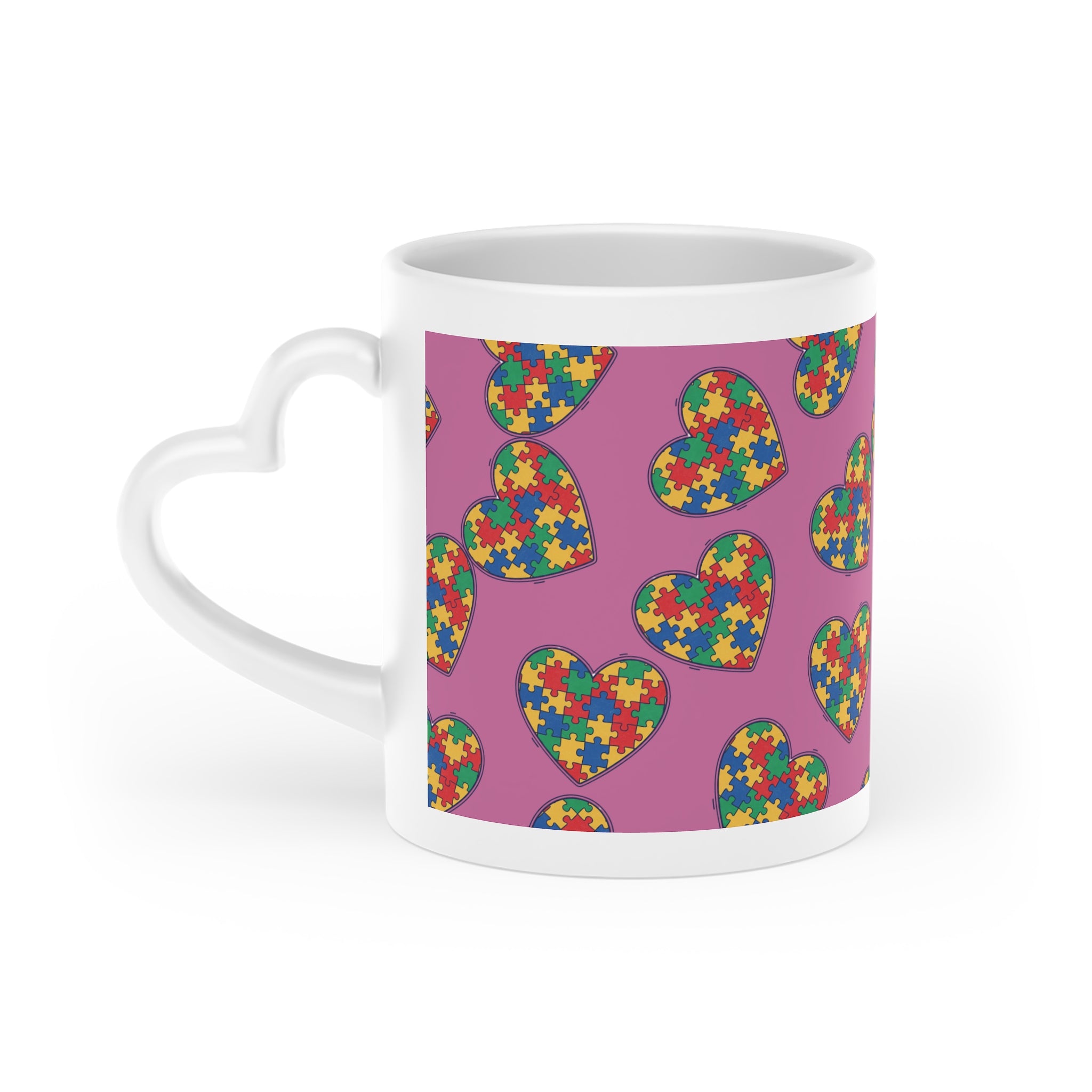 Autism Puzzle Heart Mug — Colorful Love Coffee Cup (Pink Background)