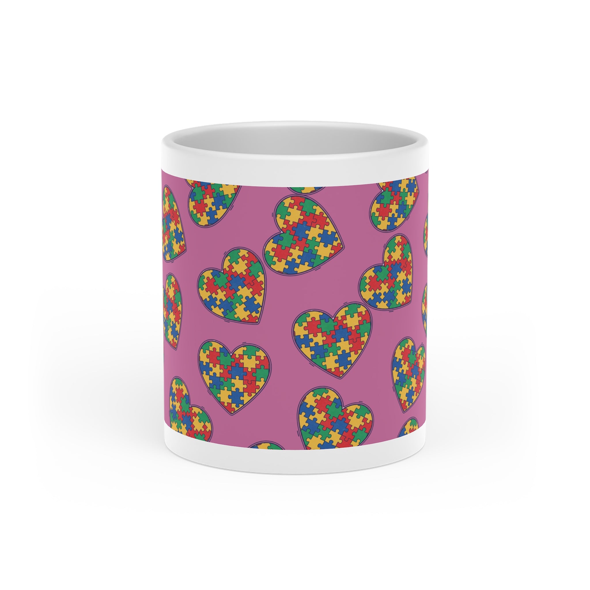 Autism Puzzle Heart Mug — Colorful Love Coffee Cup (Pink Background)